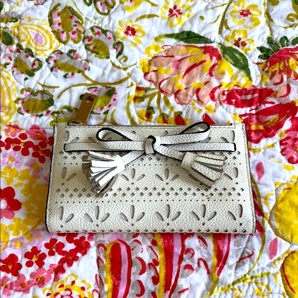 Kate Spade White Clutch with Bow Embellishments